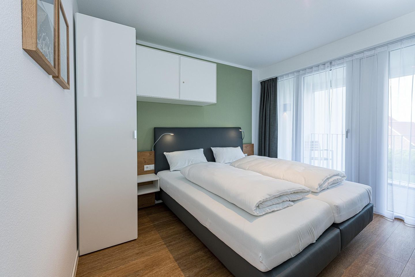 Deichhäuser Anna Küste Deichhäuser Anna Küste 8-23 Bensersiel - Schlafzimmer mit Doppelbett