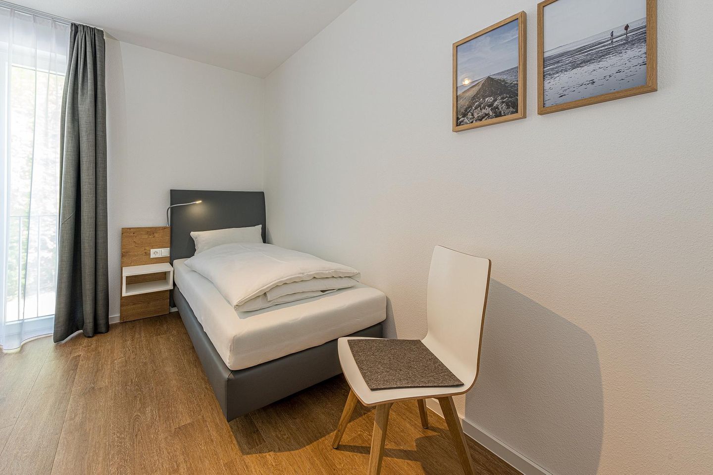 Deichhäuser Anna Küste Deichhäuser Anna Küste 8-24 Bensersiel - Schlafzimmer mit zwei Einzelbetten