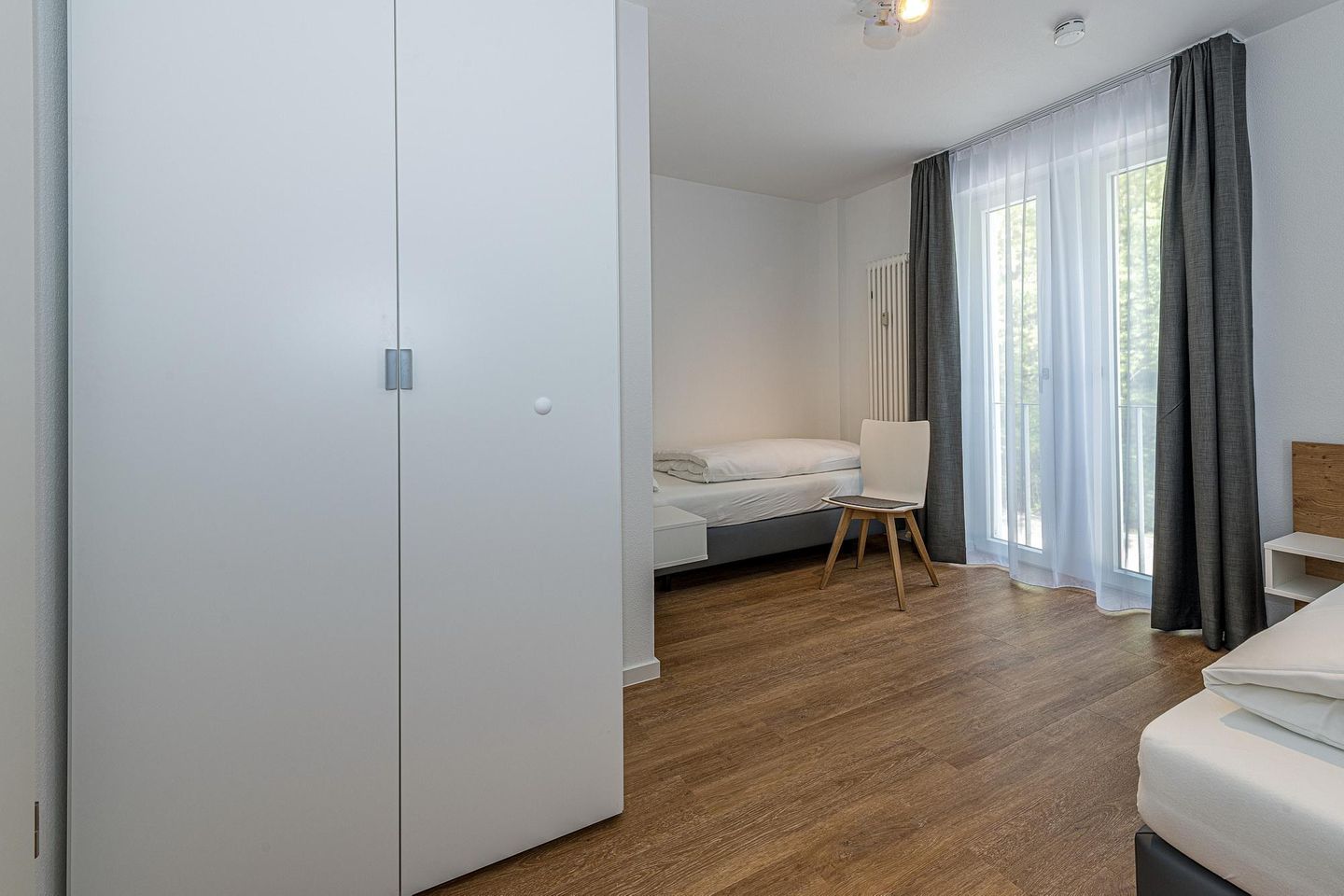 Deichhäuser Anna Küste Deichhäuser Anna Küste 8-24 Bensersiel - Schlafzimmer mit zwei Einzelbetten