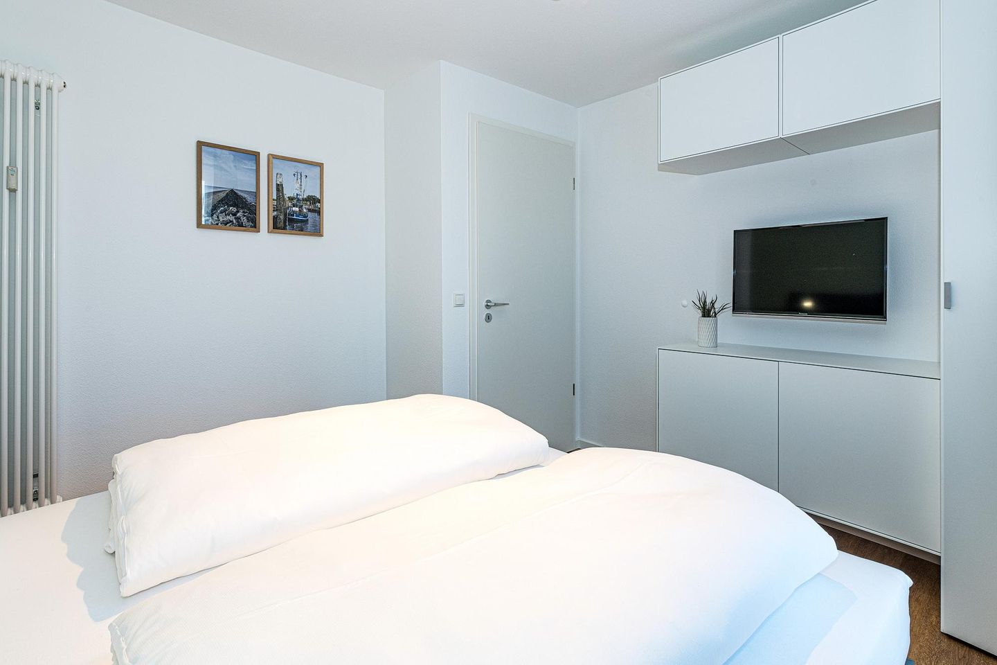 Deichhäuser Anna Küste Deichhäuser Anna Küste 8-30 Bensersiel - Schlafzimmer mit Doppelbett