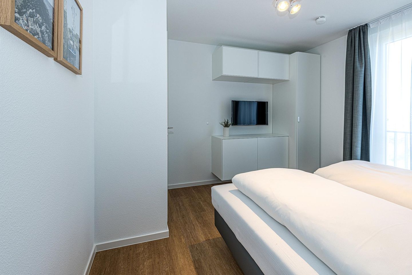 Deichhäuser Anna Küste Deichhäuser Anna Küste 8-30 Bensersiel - Schlafzimmer mit Doppelbett