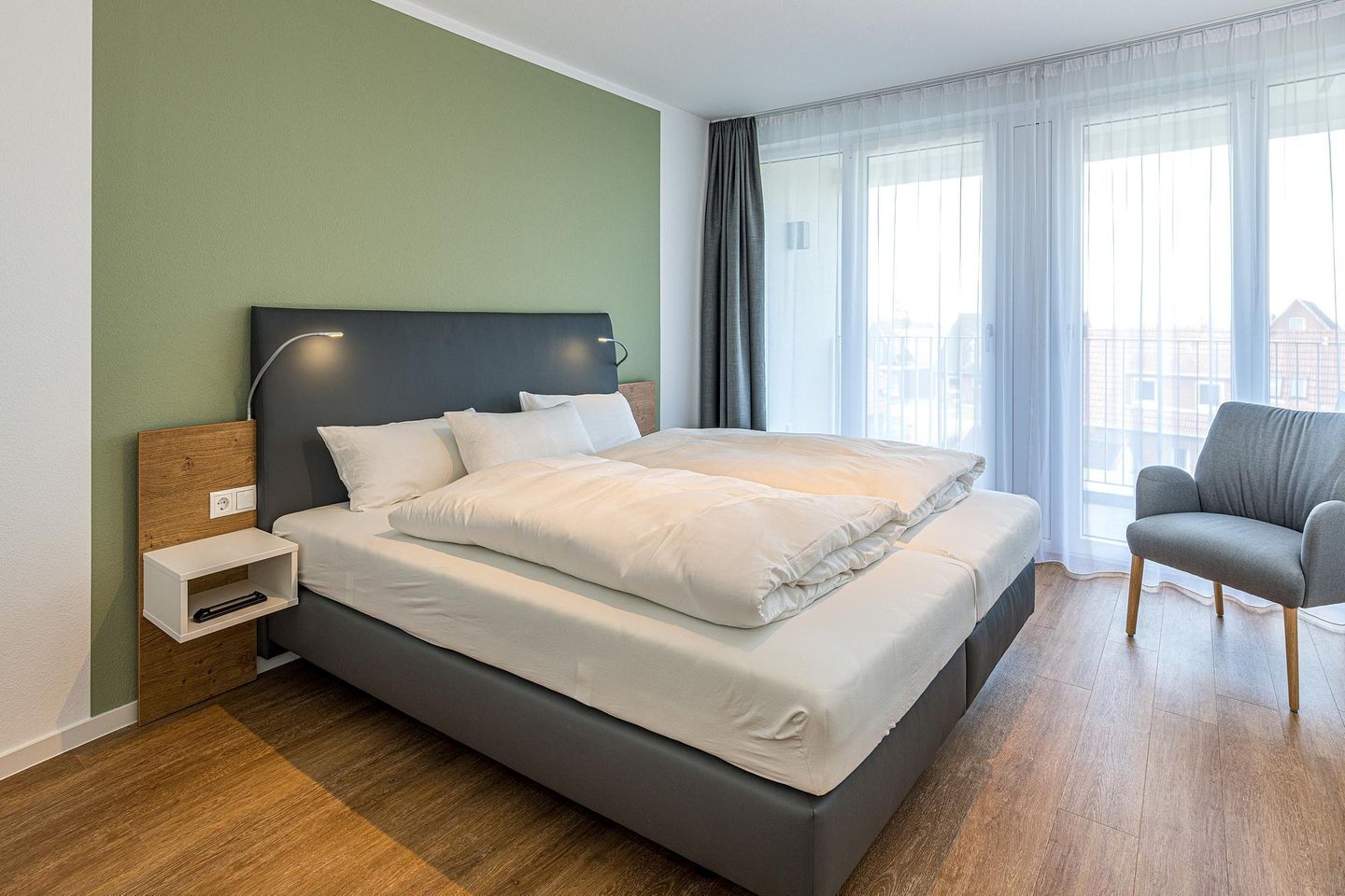 Deichhäuser Anna Küste Deichhäuser Anna Küste 8-31 Bensersiel - Schlafzimmer mit Doppelbett