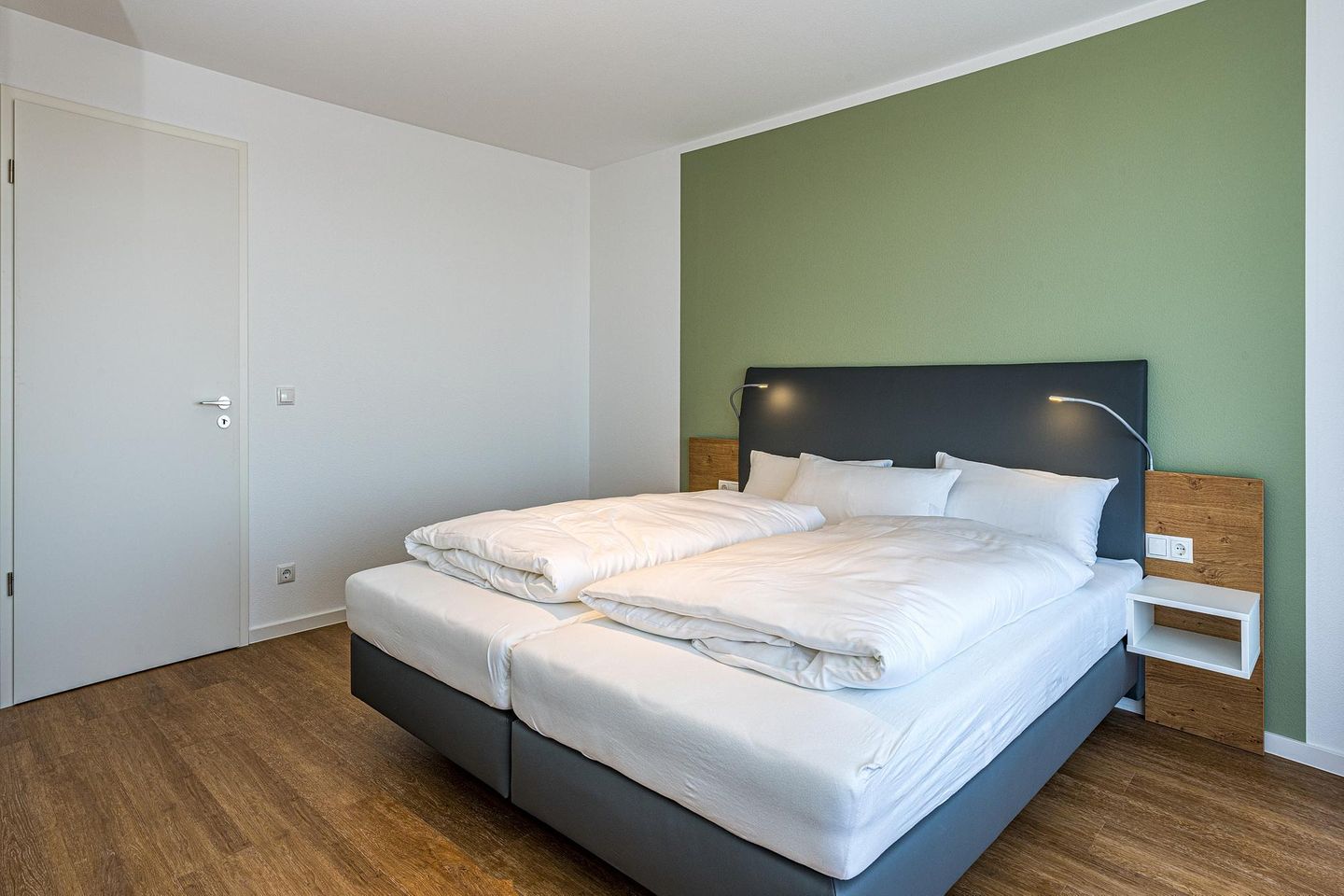 Deichhäuser Anna Küste Deichhäuser Anna Küste 8-31 Bensersiel - Schlafzimmer mit Doppelbett