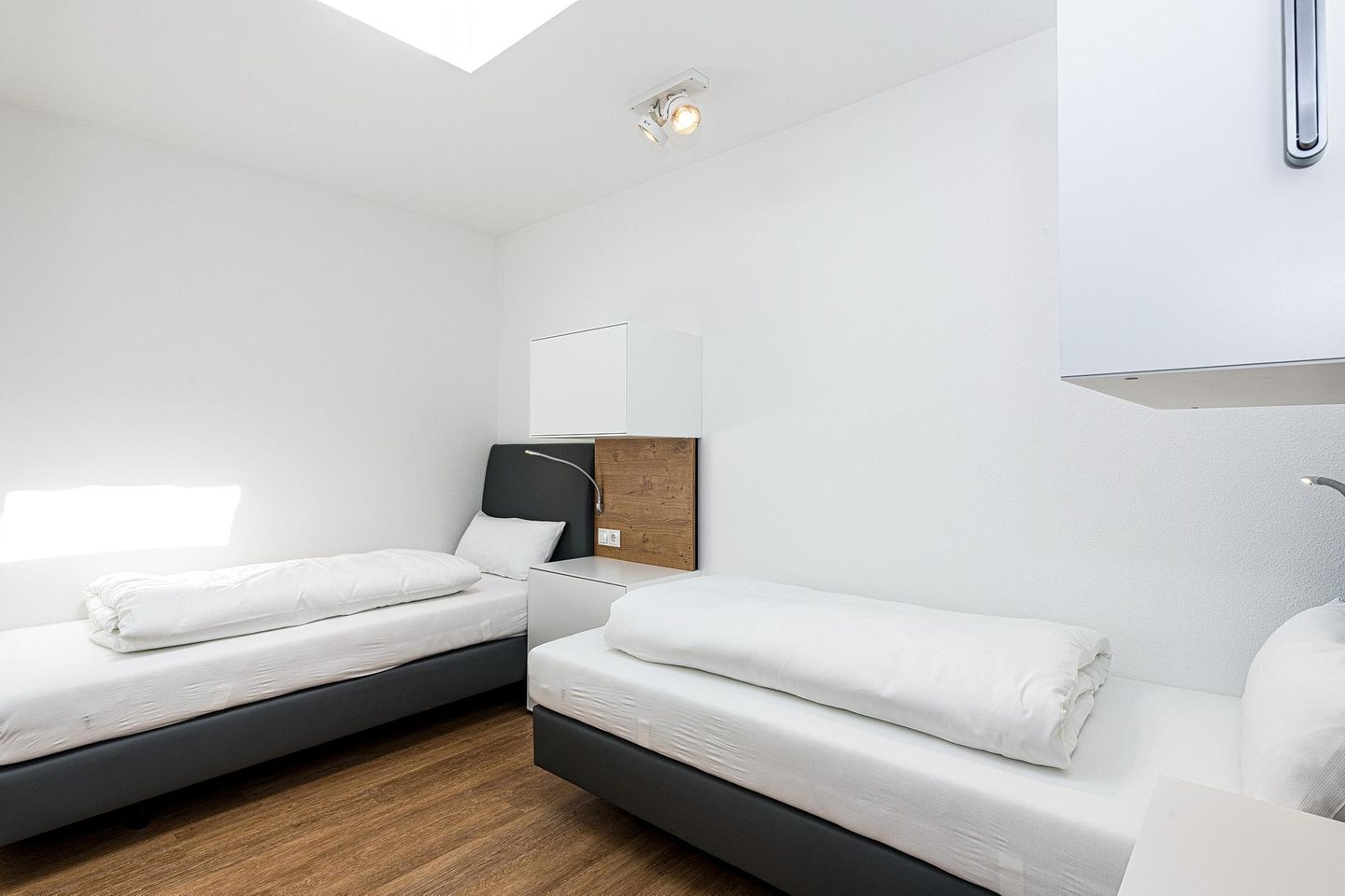 Deichhäuser Anna Küste Deichhäuser Anna Küste 8-31 Bensersiel - Schlafzimmer mit zwei Einzelbetten