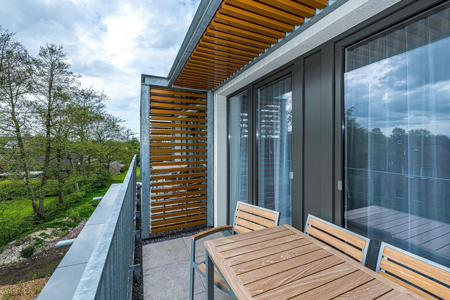 Deichhäuser Anna Küste Deichhäuser Anna Küste 8-31 Bensersiel - Balkon mit Gartenmöbeln