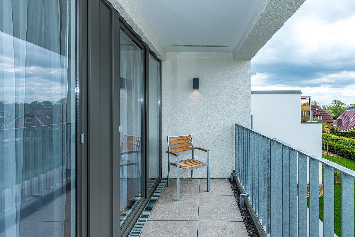 Deichhäuser Anna Küste Deichhäuser Anna Küste 8-31 Bensersiel - Balkon mit Gartenmöbeln