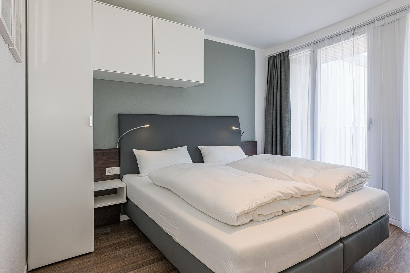 Deichhäuser Anna Küste Deichhäuser Anna Küste 8-33 Bensersiel - Schlafzimmer mit Doppelbett