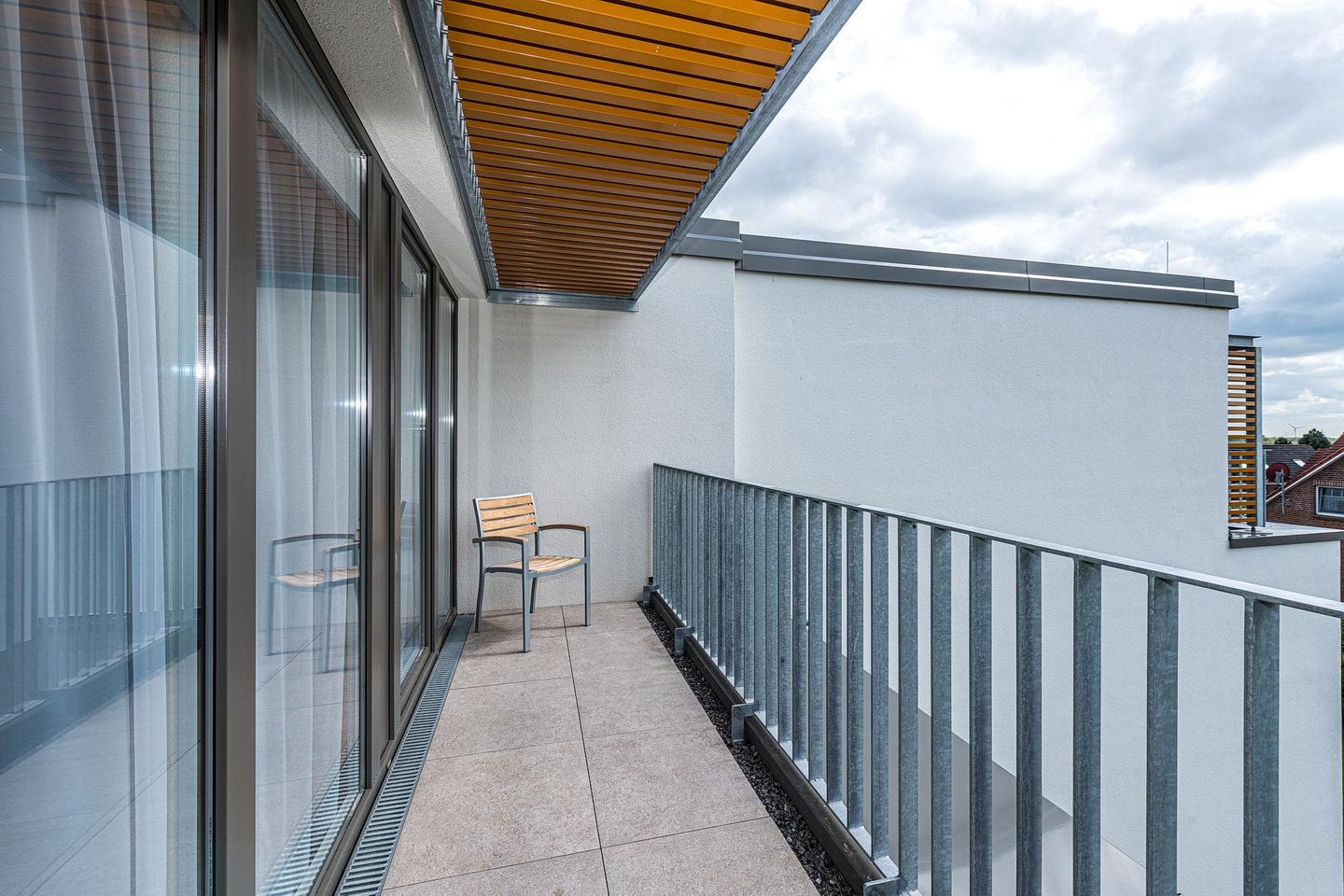 Deichhäuser Anna Küste Deichhäuser Anna Küste 8-33 Bensersiel - Balkon mit Gartenmöbeln