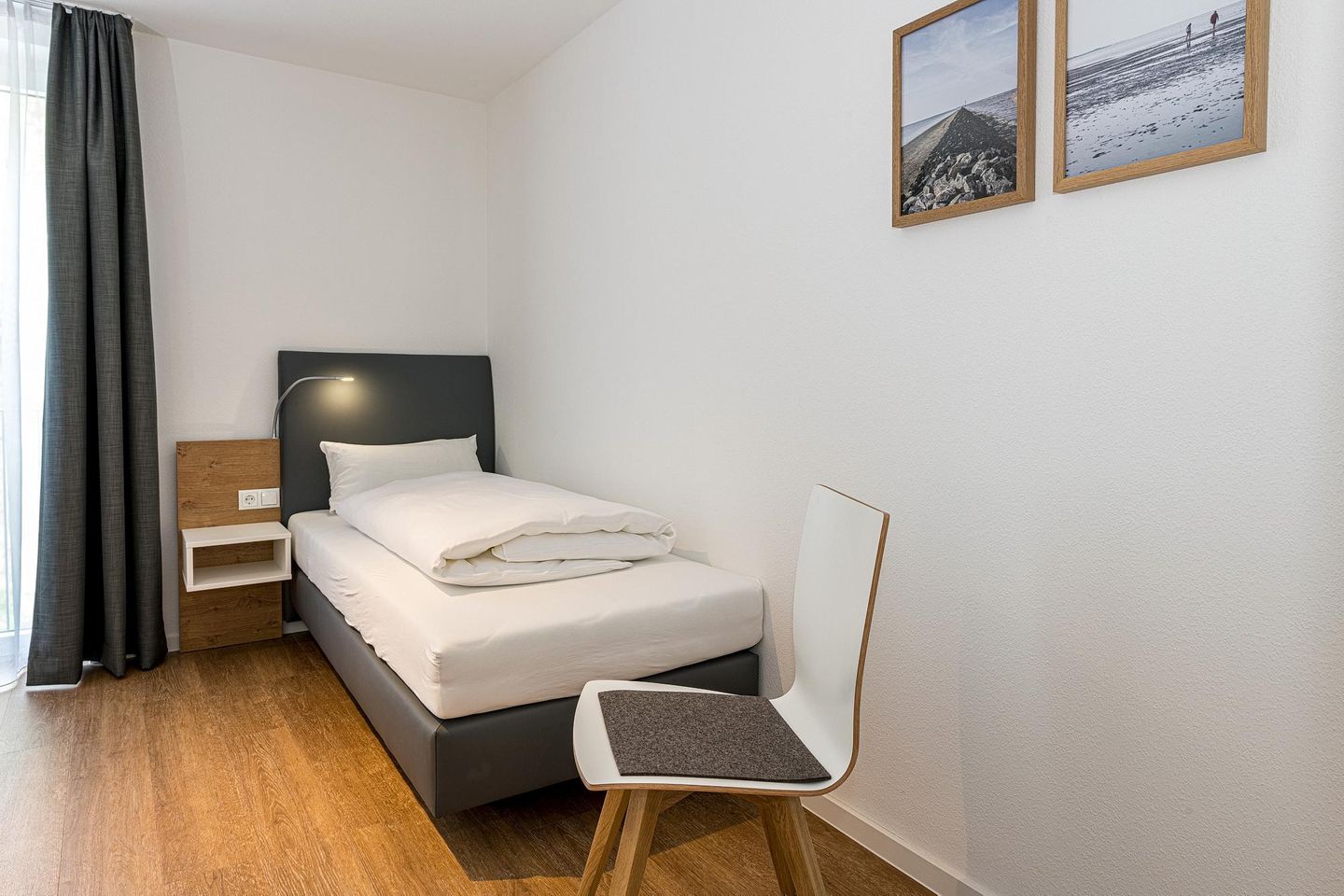 Deichhäuser Anna Küste Deichhäuser Anna Küste 8-34 Bensersiel - Schlafzimmer mit zwei Einzelbetten