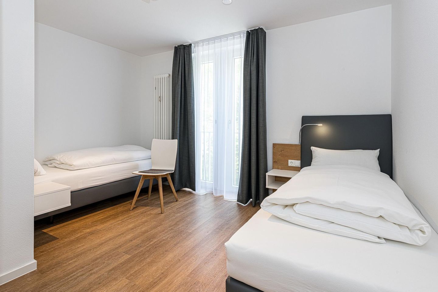 Deichhäuser Anna Küste Deichhäuser Anna Küste 8-34 Bensersiel - Schlafzimmer mit zwei Einzelbetten