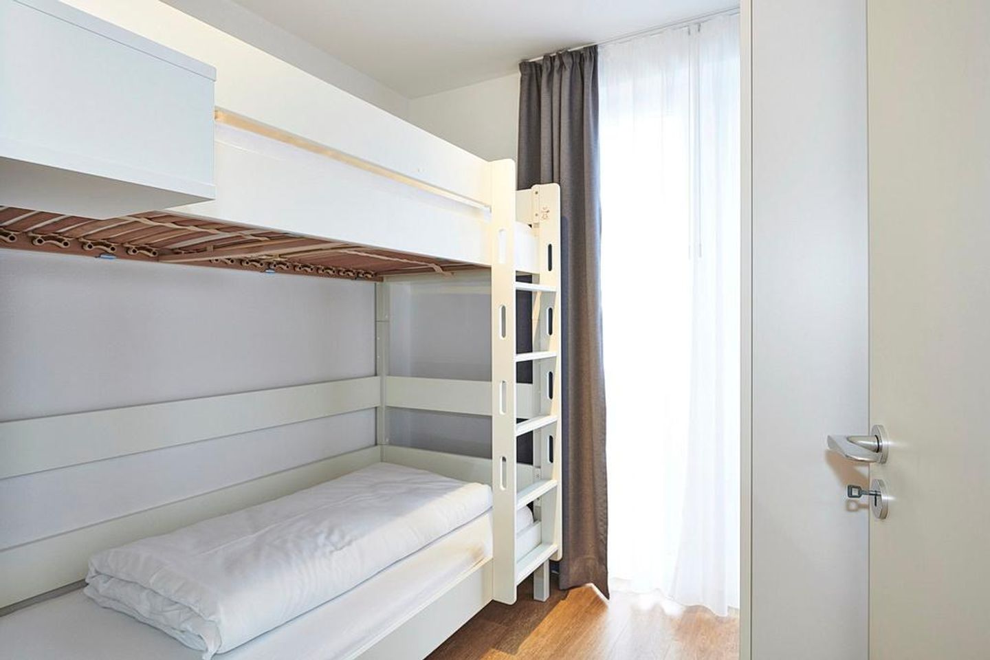 Deichhäuser Anna Küste Deichhäuser Anna Küste 4-30 Bensersiel - Schlafzimmer mit Etagenbett