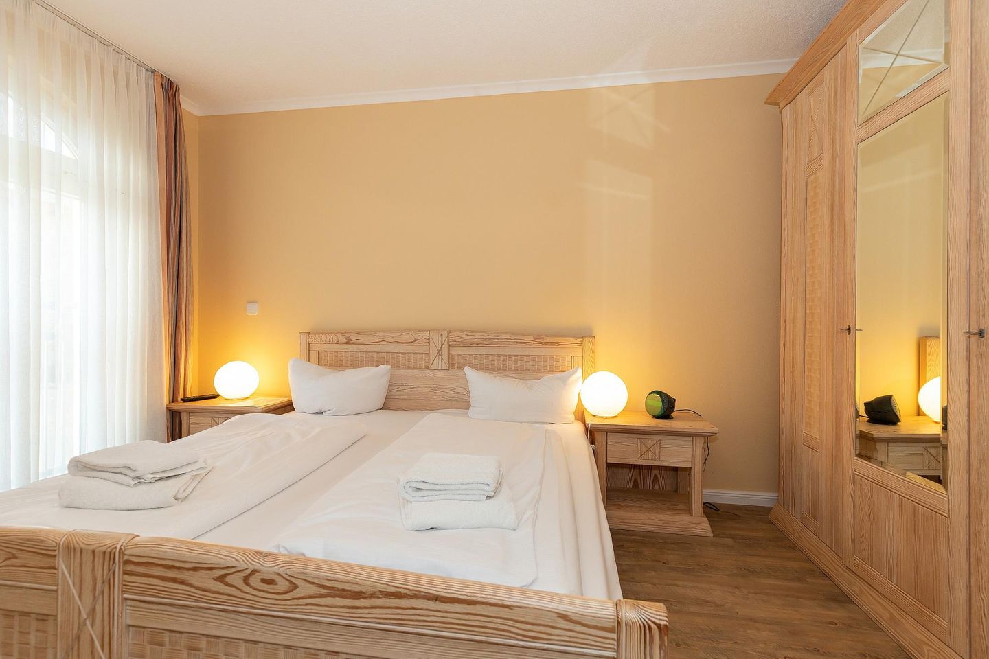 Apartmenthaus Atlantik Apartmenthaus Atlantik 102 Kühlungsborn - Schlafzimmer mit Doppelbett