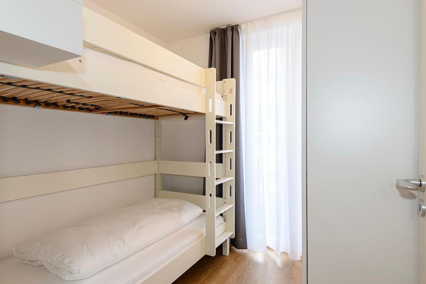 Deichhäuser Anna Küste Deichhäuser Anna Küste 1-30 Bensersiel - Schlafzimmer mit Stapelbett