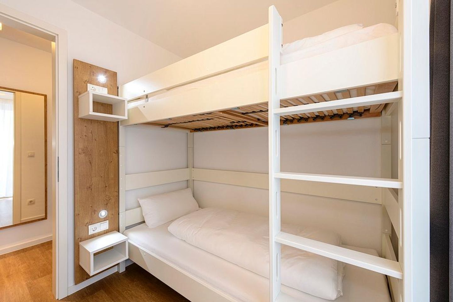 Deichhäuser Anna Küste Deichhäuser Anna Küste 1-30 Bensersiel - Schlafzimmer mit Stapelbett