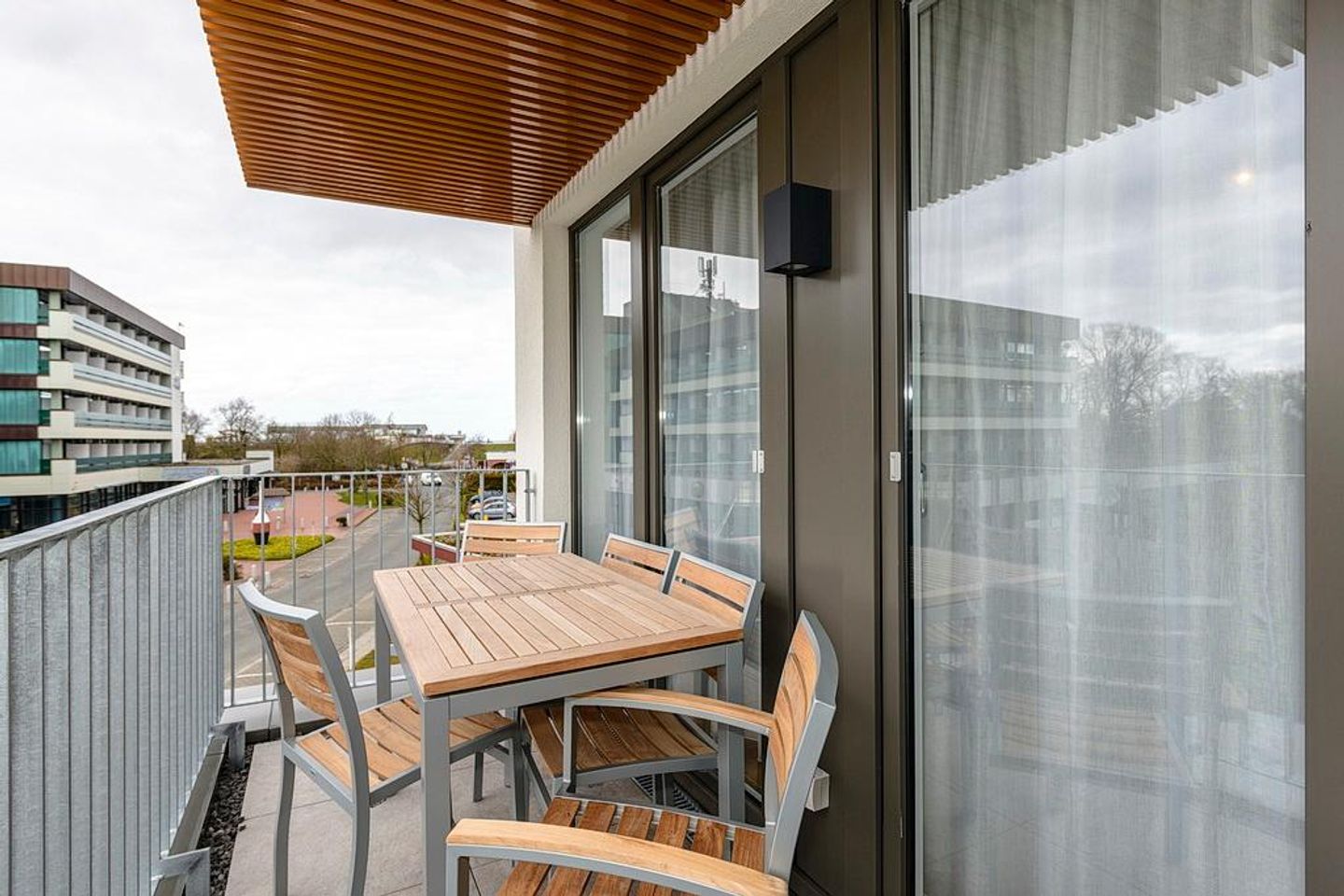 Deichhäuser Anna Küste Deichhäuser Anna Küste 1-30 Bensersiel - Balkon mit Sitzgelegenheiten