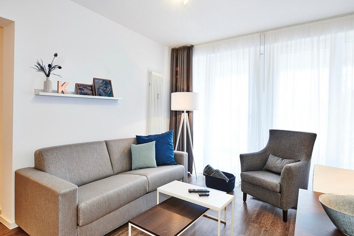 Deichhäuser Anna Küste Deichhäuser Anna Küste 1-21 Bensersiel - Wohn/Essbereich mit Couch und Sessel