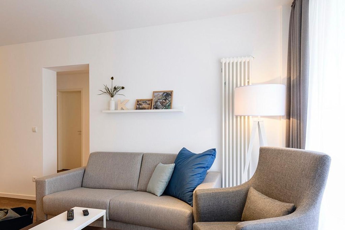 Deichhäuser Anna Küste Deichhäuser Anna Küste 1-21 Bensersiel - Wohn/Essbereich mit Couch und Sessel