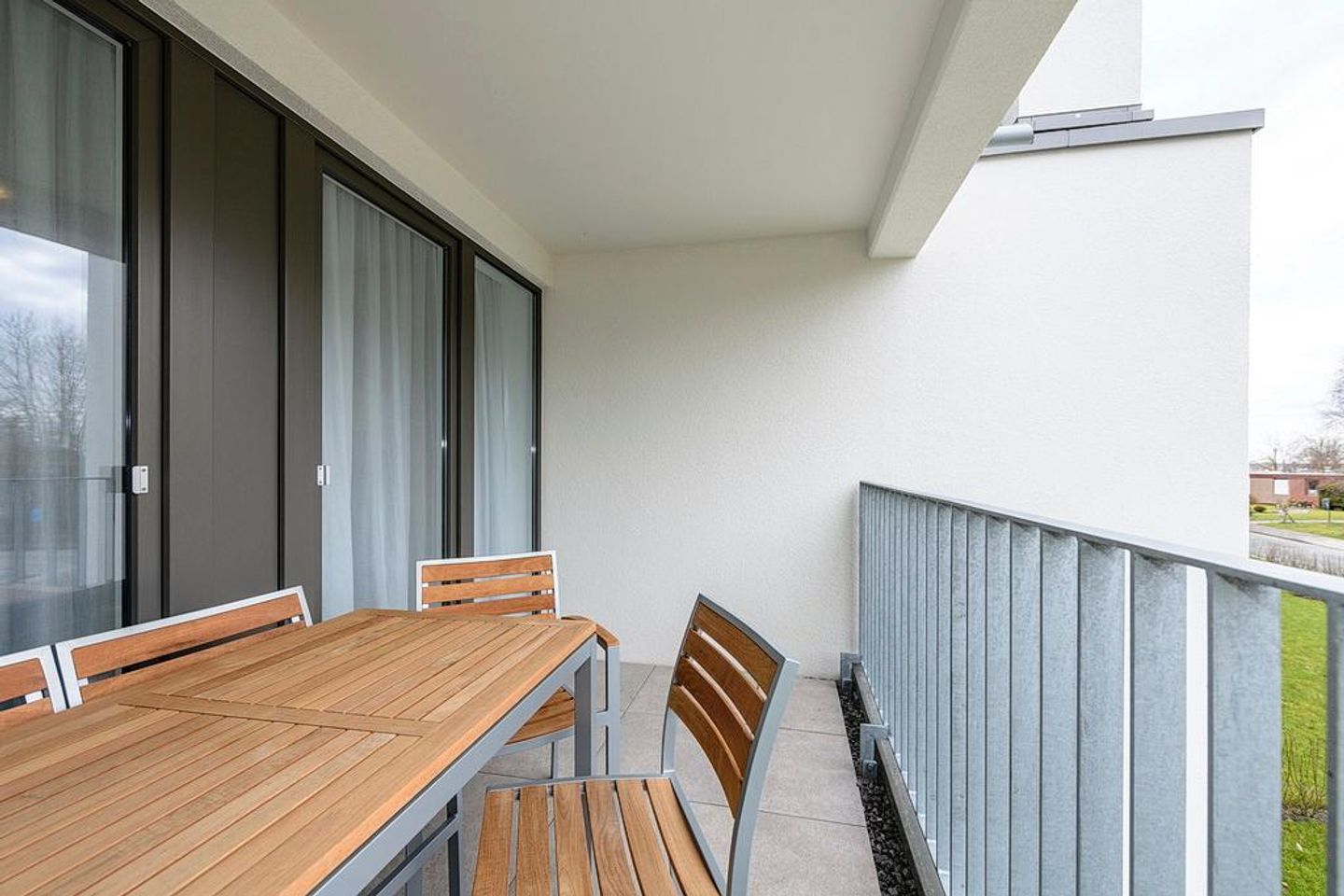 Deichhäuser Anna Küste Deichhäuser Anna Küste 1-21 Bensersiel - Balkon mit Sitzgelegenheiten