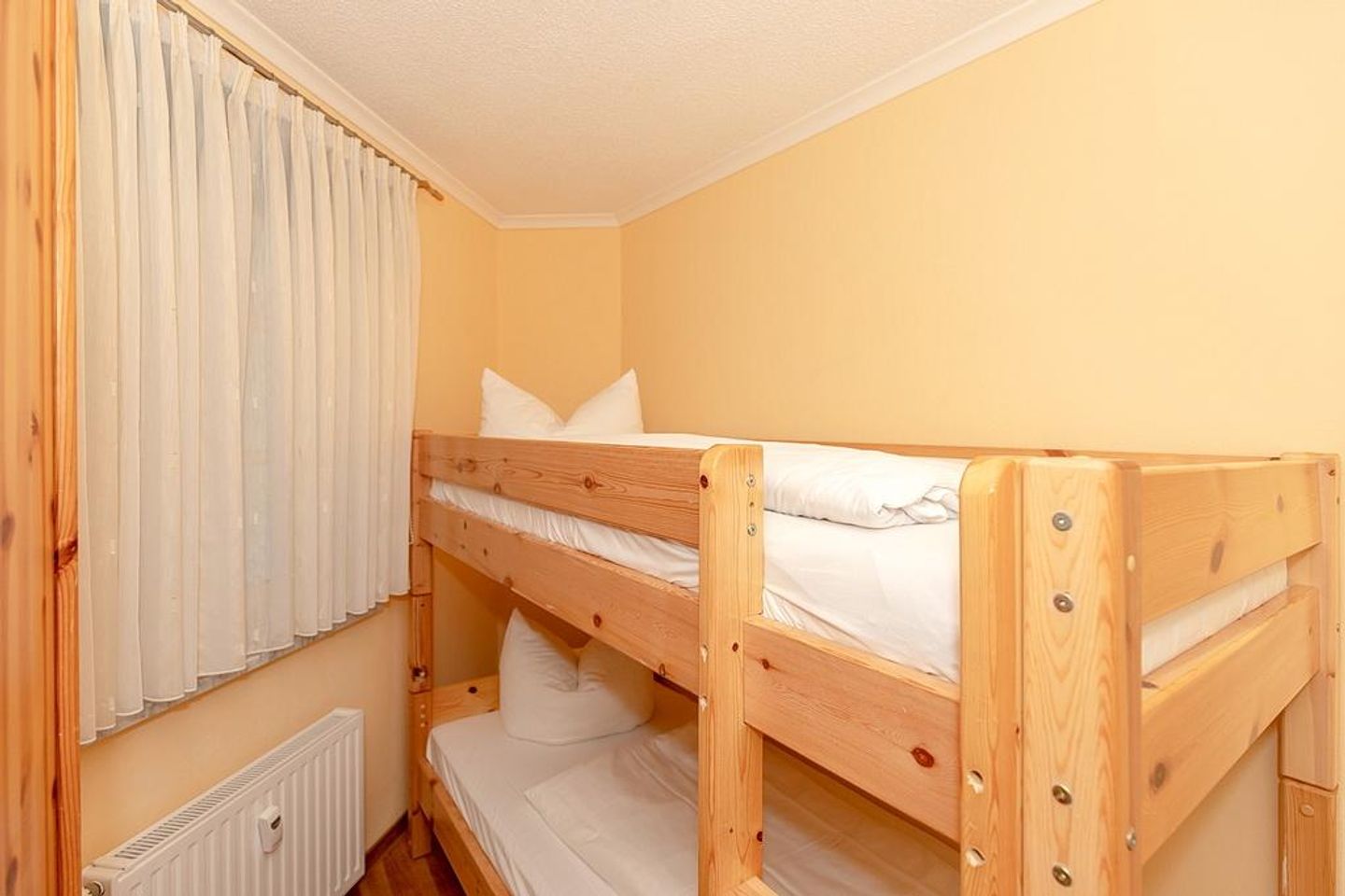 Apartmenthaus Atlantik Apartmenthaus Atlantik 212 Kühlungsborn - Schlafzimmer mit Etagenbett