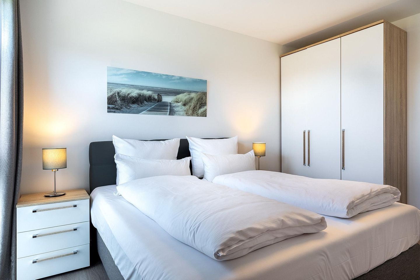 Aparthotel Ostseeallee Aparthotel Ostseeallee 2-14 Boltenhagen - Schlafzimmer mit Kleiderschrank