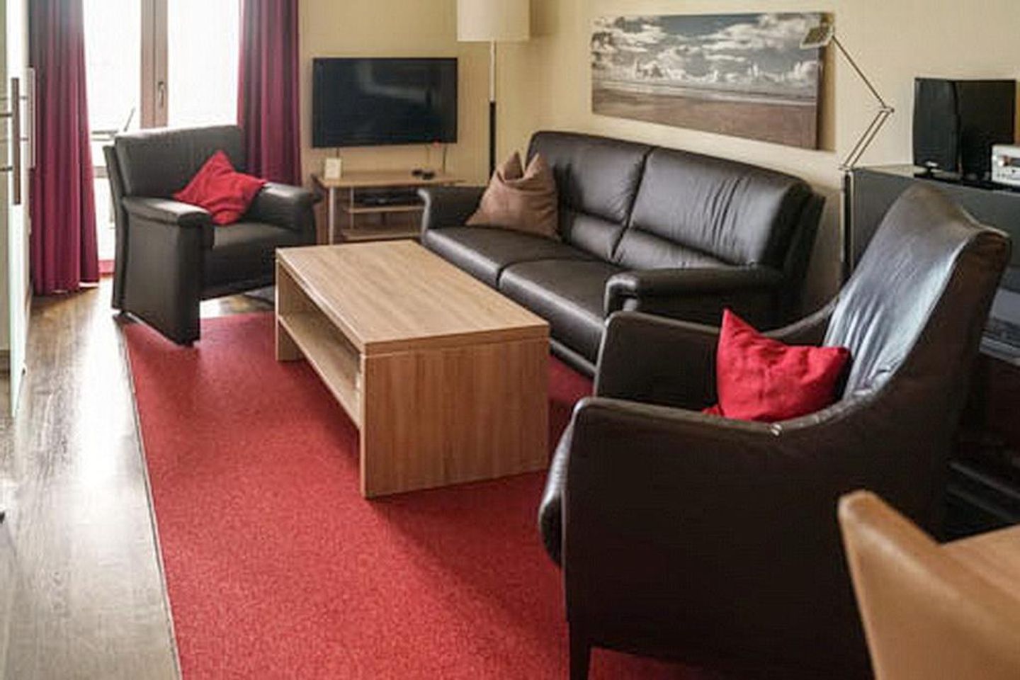 Resort Deichgraf Resort Deichgraf 31-15 Wremen - Wohn-Essbereich mit Couch