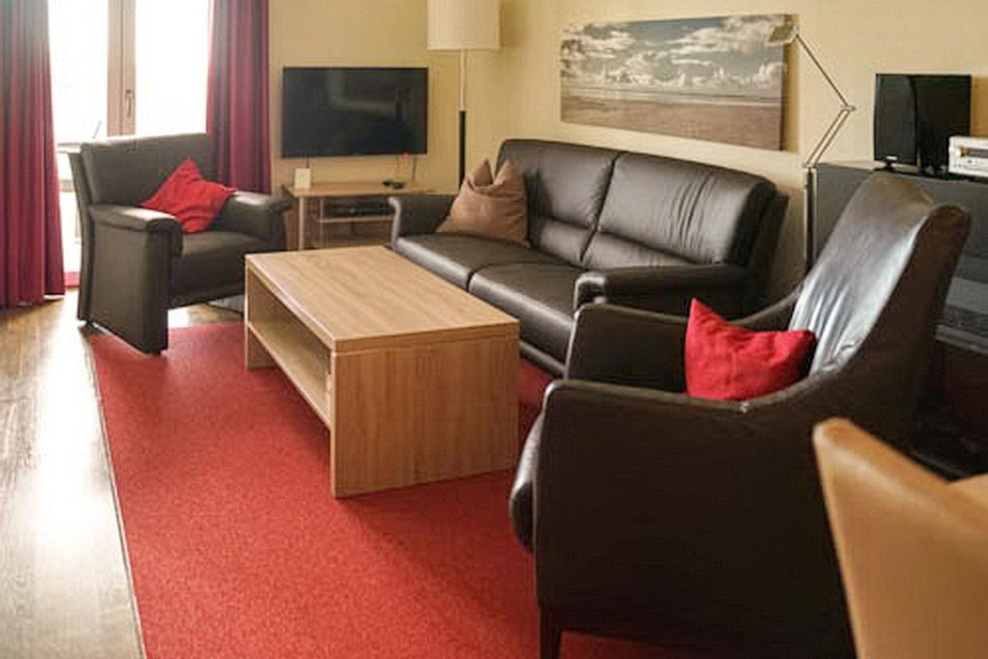 Resort Deichgraf Resort Deichgraf 31-15 Wremen - Wohn-Essbereich mit Couch