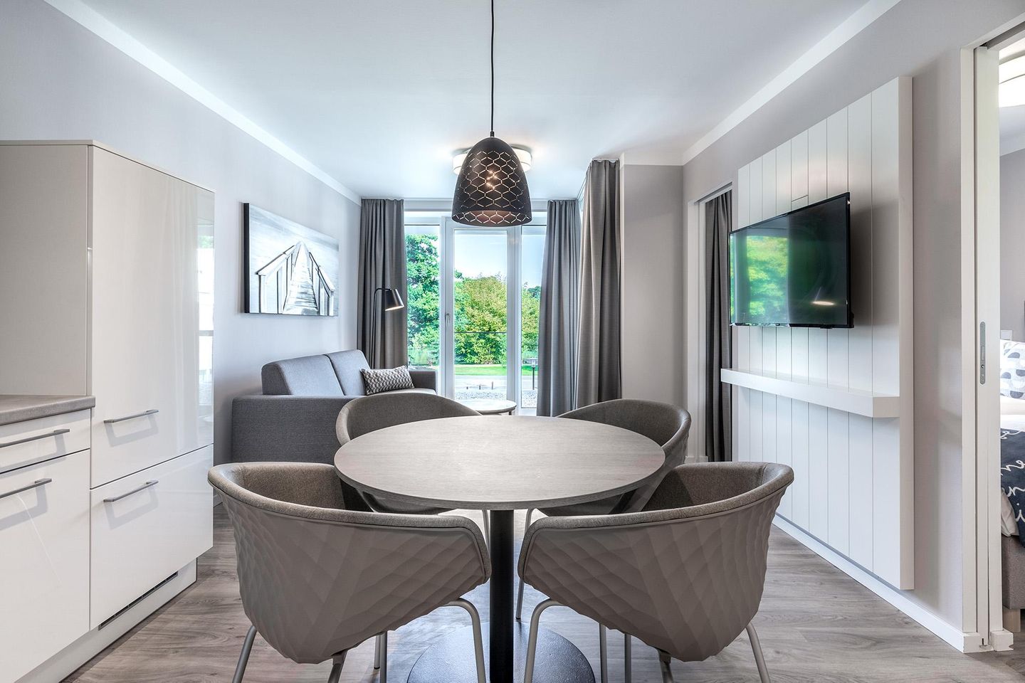 Godewindpark Travemünde Godewindpark Travemünde 1-08 Travemünde - Wohn-Essbereich mit Sitzgelegenheit