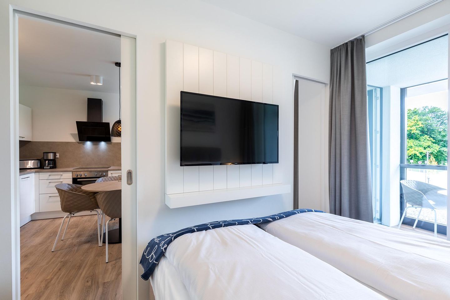 Godewindpark Travemünde Godewindpark Travemünde 1-12 Travemünde - Schlafzimmer mit Blick zum Wohn-Essbereich