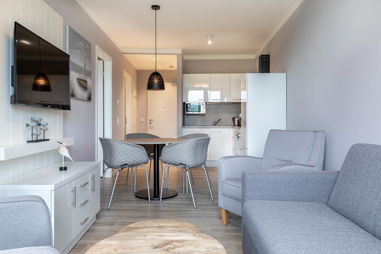 Godewindpark Travemünde Godewindpark Travemünde 3-14 Travemünde - Wohn-Essbereich mit Doppelschlafcouch und Flatscreen-TV