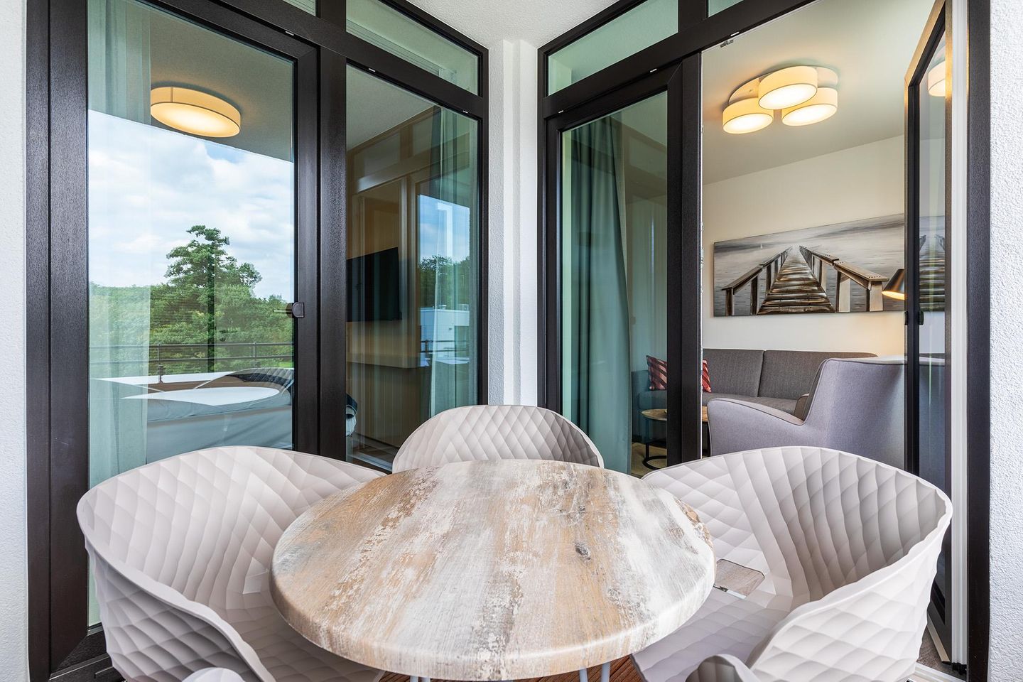 Godewindpark Travemünde Godewindpark Travemünde 2-10 Travemünde - Überdachte Loggia mit Zugang zum Schlafzimmer und Wohn-/Essbereich