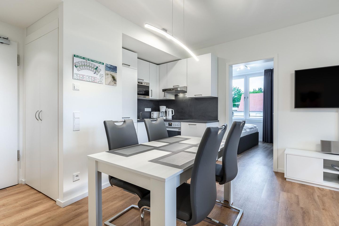 Godewindpark Travemünde Godewindpark Travemünde 3-02 Travemünde - Wohn-Essbereich mit Küchentisch und Sitzgelegenheit