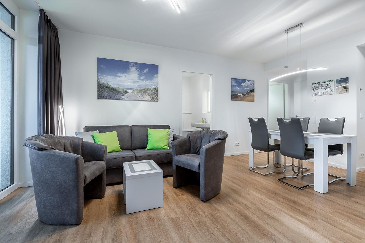 Godewindpark Travemünde Godewindpark Travemünde 3-02 Travemünde - Wohn-Essbereich mit Couchtisch und Sitzgelegenheit