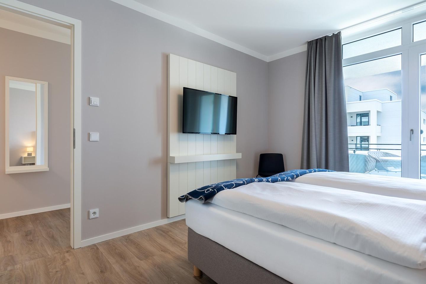 Godewindpark Travemünde Godewindpark Travemünde 2-03 Travemünde - Schlafzimmer mit Flatscreen-TV