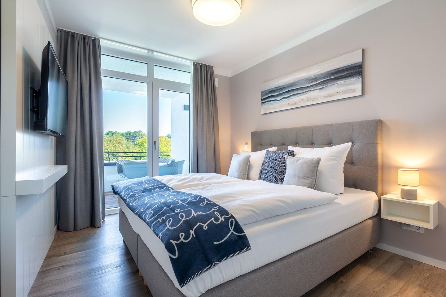 Godewindpark Travemünde Godewindpark Travemünde 2-14 Travemünde - Schlafzimmer mit Zugang zur Loggia