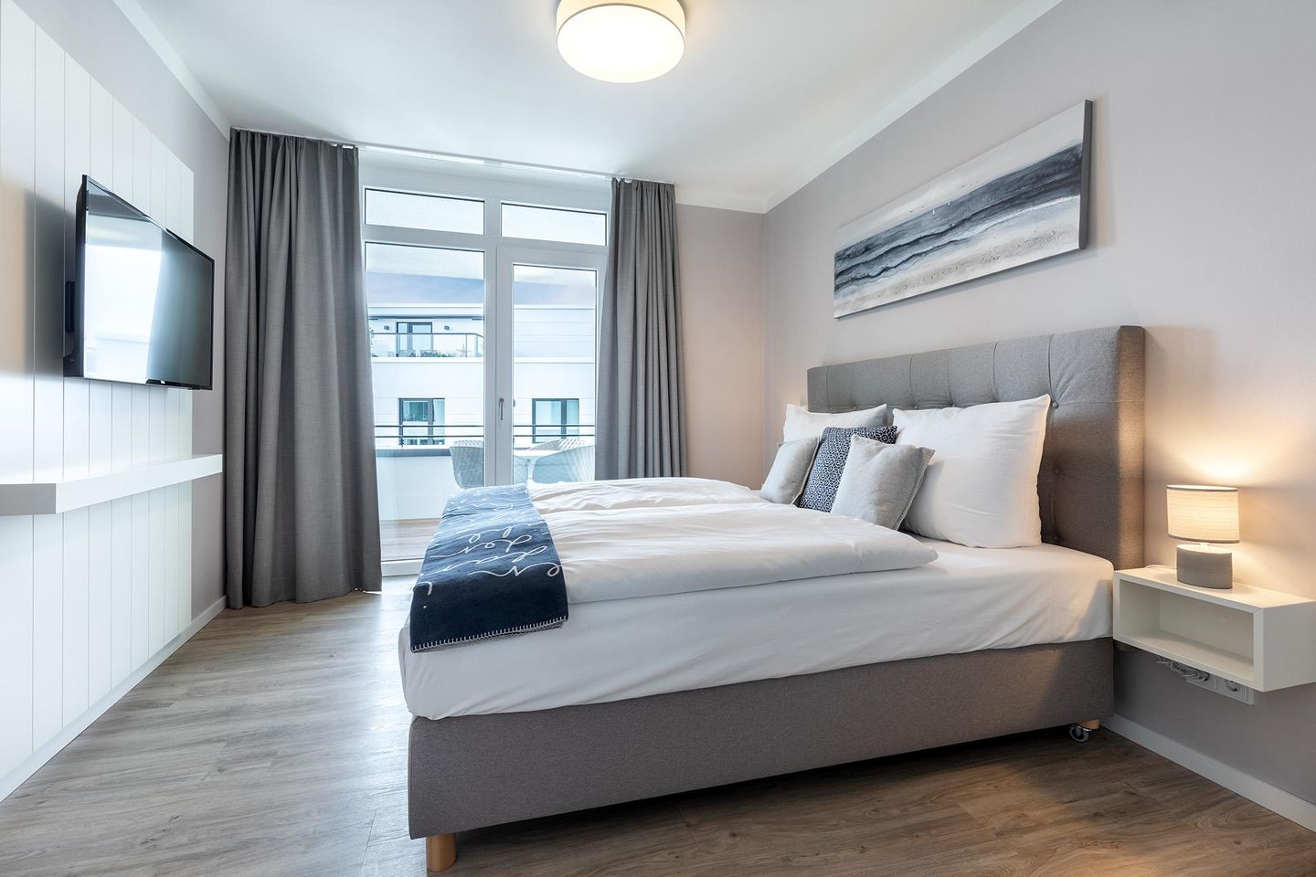 Godewindpark Travemünde Godewindpark Travemünde 3-11 Travemünde - Schlafzimmer mit Zugang zur Loggia