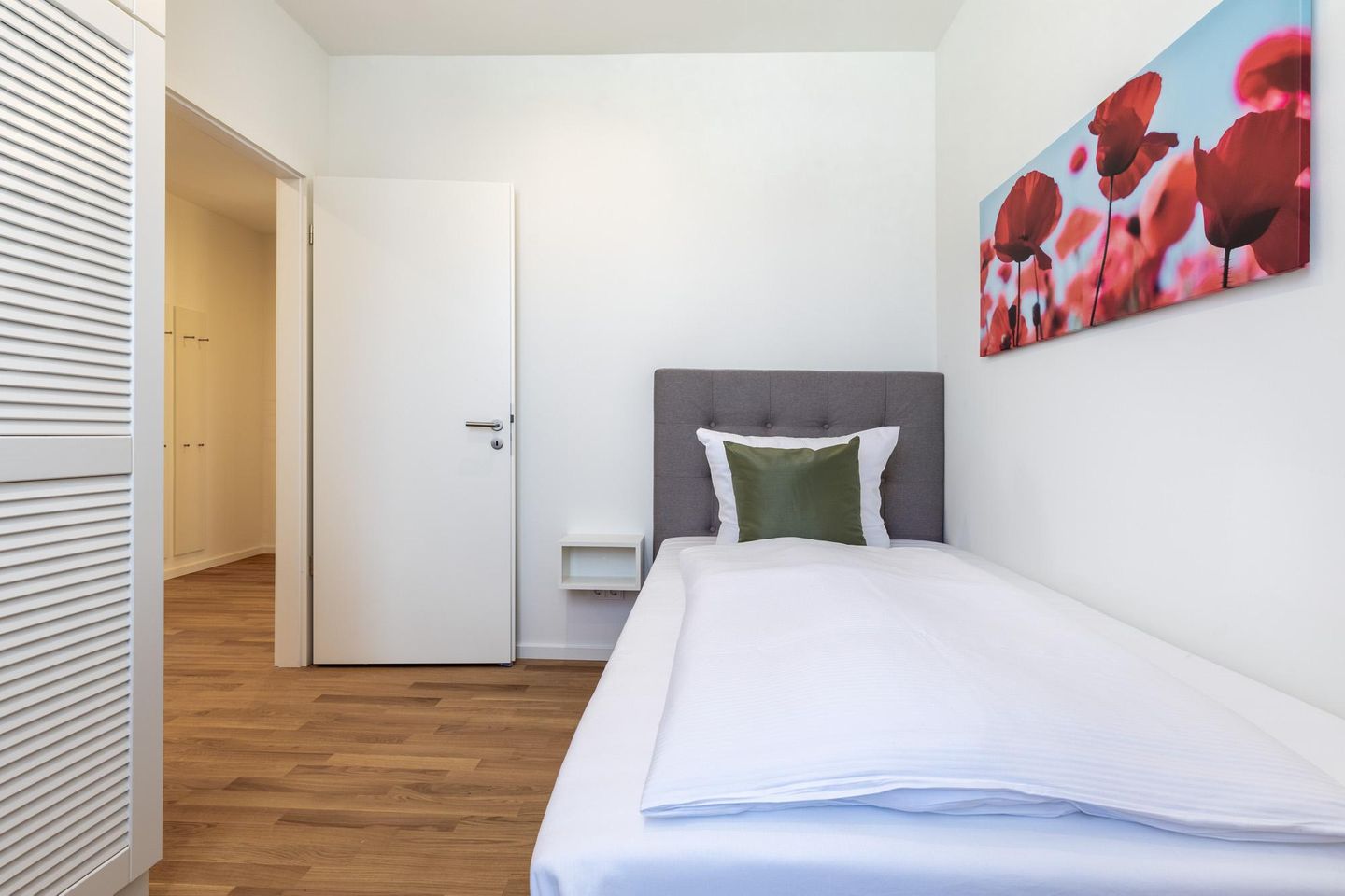 Villa Godewindpark Travemünde Villa Godewindpark Travemünde 02 Travemünde - Schlafzimmer mit Einzel-Boxspringbett