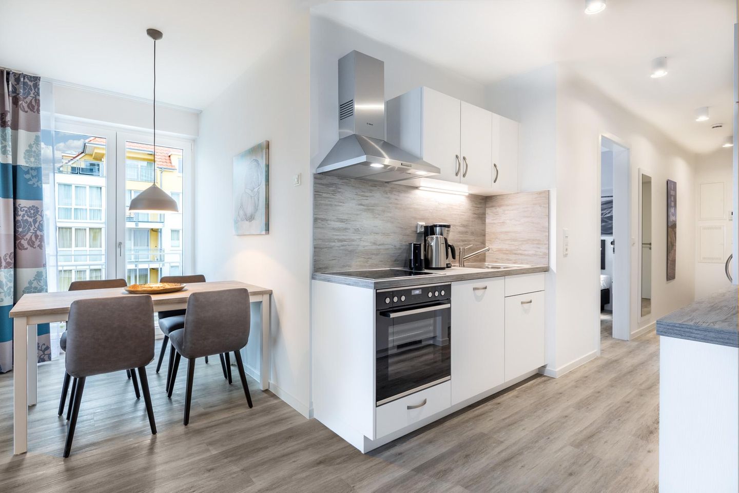 Apartmentanlage Meerblickvilla Apartmentanlage Meerblickvilla 1-04 Großenbrode - Wohn-/Essbereich mit Esstisch und Bestuhlung - gbmv1-04 - Großenbrode