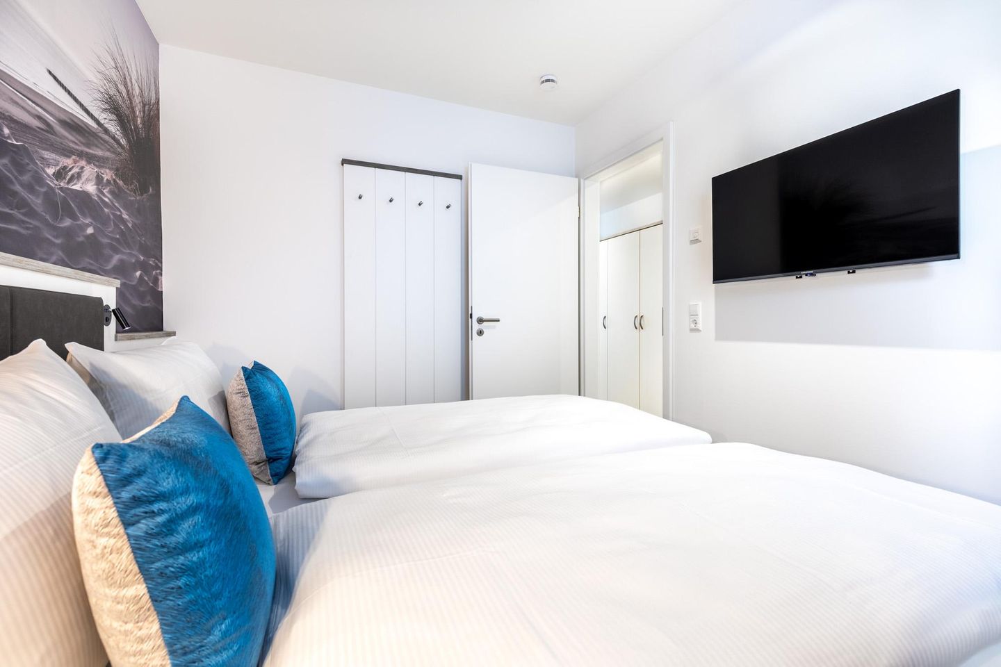 Apartmentanlage Meerblickvilla Apartmentanlage Meerblickvilla 1-14 Großenbrode - Schlafzimmer mit Flatscreen-TV