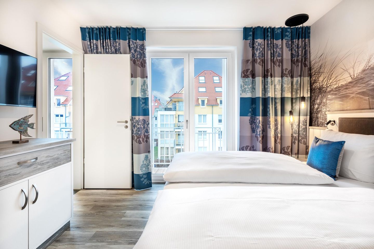 Apartmentanlage Meerblickvilla Apartmentanlage Meerblickvilla 2-18 Großenbrode - Schlafzimmer mit Flatscreen-TV