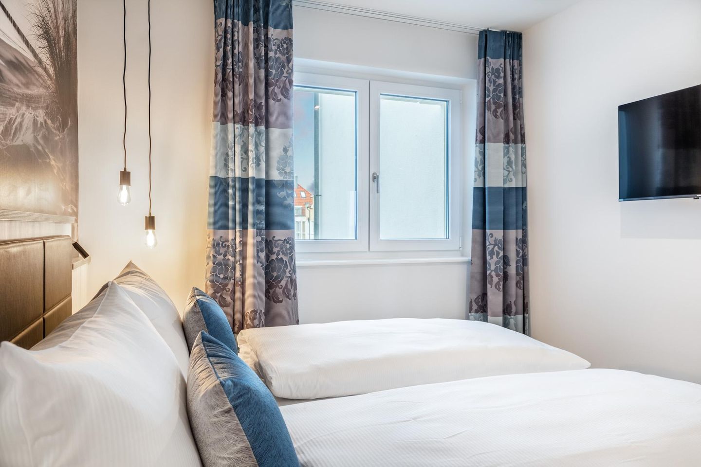 Apartmentanlage Meerblickvilla Apartmentanlage Meerblickvilla 2-24 Großenbrode - Schlafzimmer 1 mit Flatscreen-TV