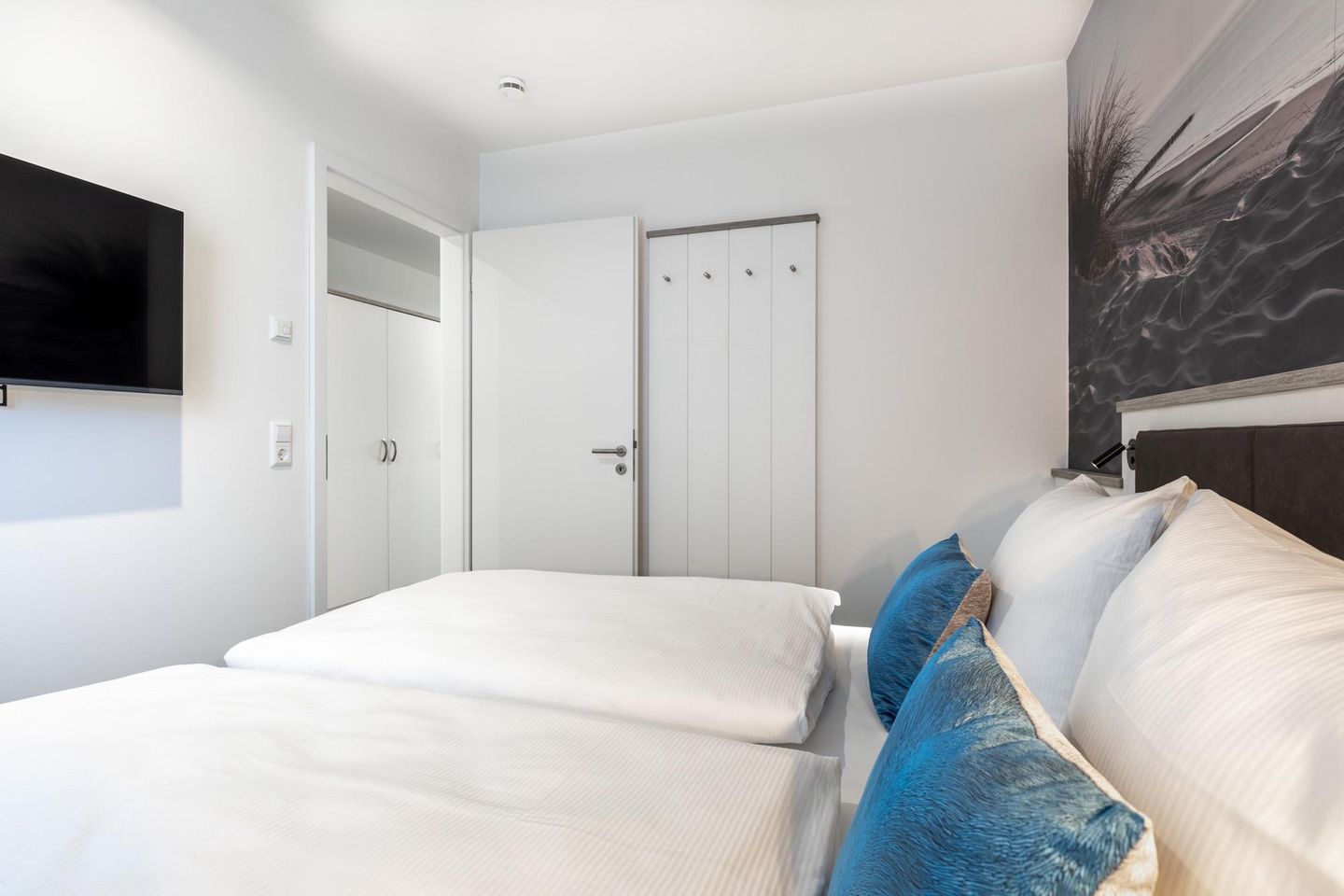 Apartmentanlage Meerblickvilla Apartmentanlage Meerblickvilla 1-06 Großenbrode - Schlafzimmer mit Flatscreen-TV