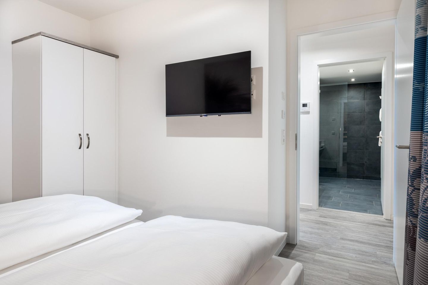 Apartmentanlage Meerblickvilla Apartmentanlage Meerblickvilla 2-23 Großenbrode - Schlafzimmer 2 mit Flatscreen-TV