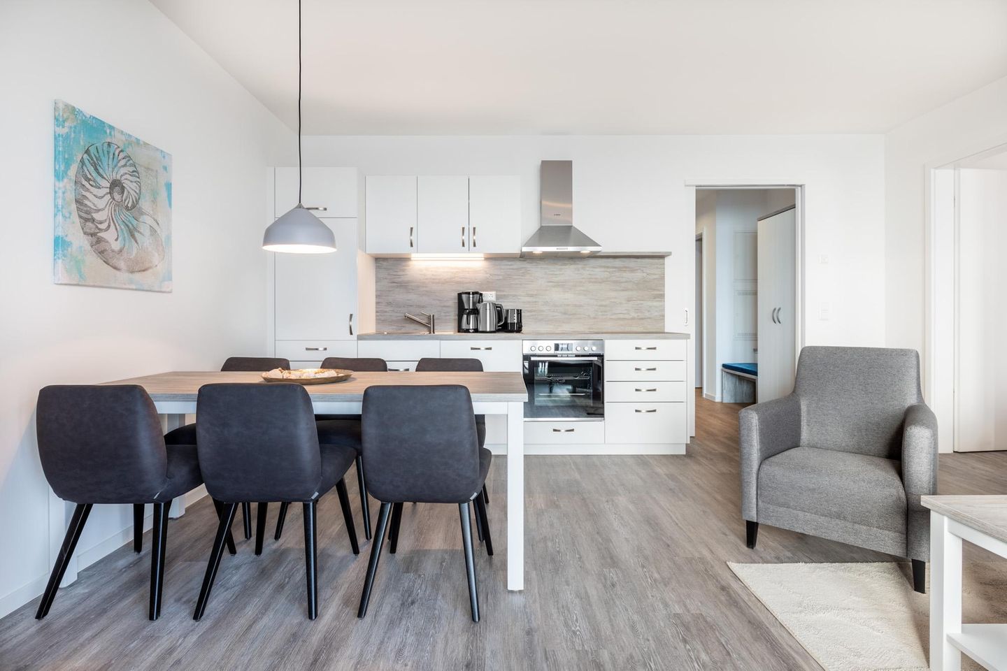 Apartmentanlage Meerblickvilla Apartmentanlage Meerblickvilla 3-37 Großenbrode - Wohn-/Essbereich mit Sitzgelegenheit