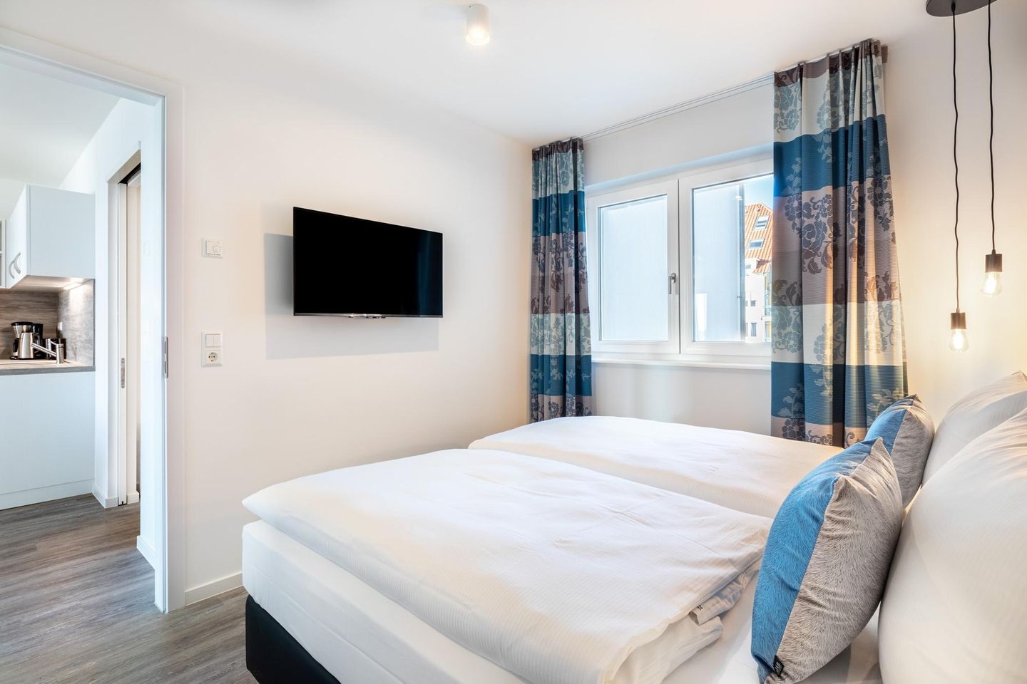 Apartmentanlage Meerblickvilla Apartmentanlage Meerblickvilla 1-11 Großenbrode - Schlafzimmer 1 mit Flatscreen-TV