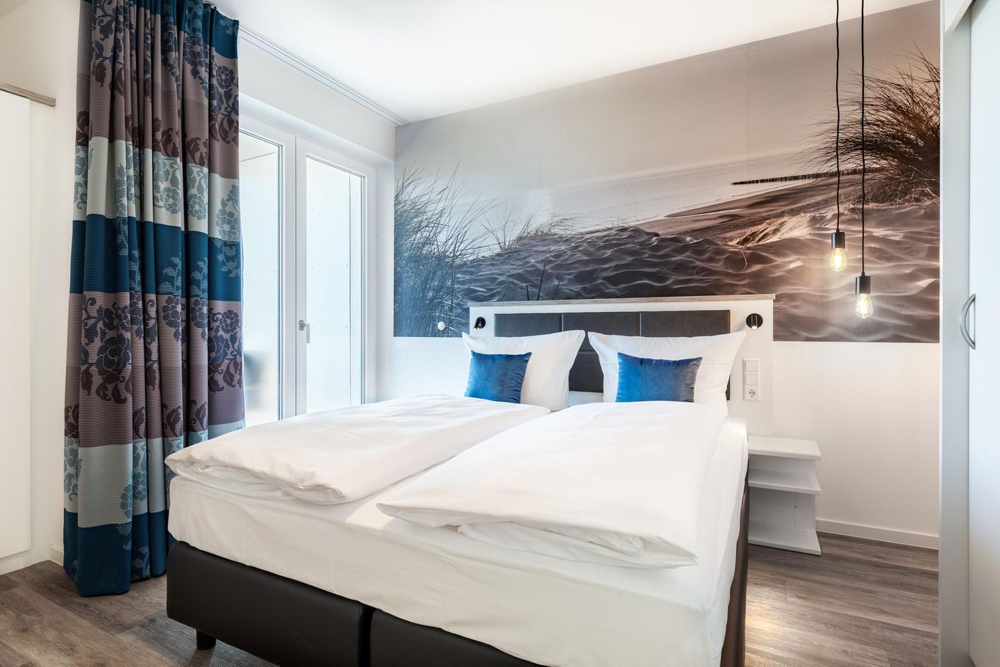 Apartmentanlage Meerblickvilla Apartmentanlage Meerblickvilla 1-12 Großenbrode - Schlafzimmer mit Zugang zum Balkon