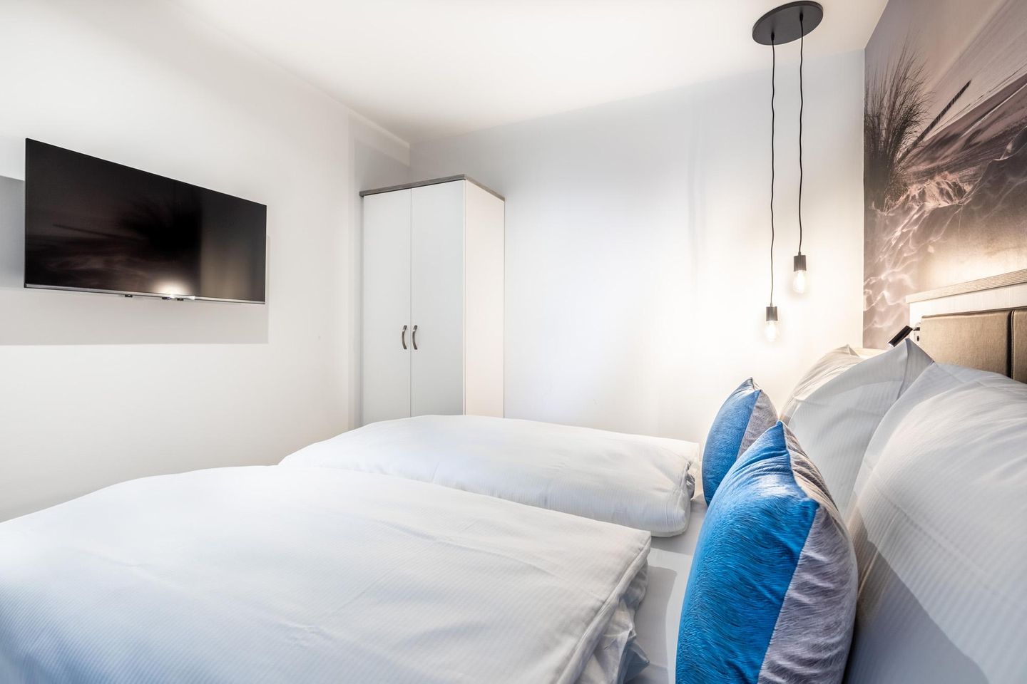 Apartmentanlage Meerblickvilla Apartmentanlage Meerblickvilla 1-12 Großenbrode - Schlafzimmer mit Flatscreen-TV