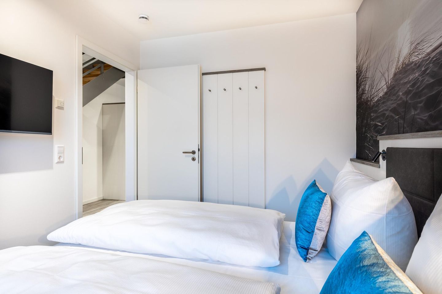 Apartmentanlage Meerblickvilla Apartmentanlage Meerblickvilla 3-33 Großenbrode - Schlafzimmer mit Flatscreen-TV