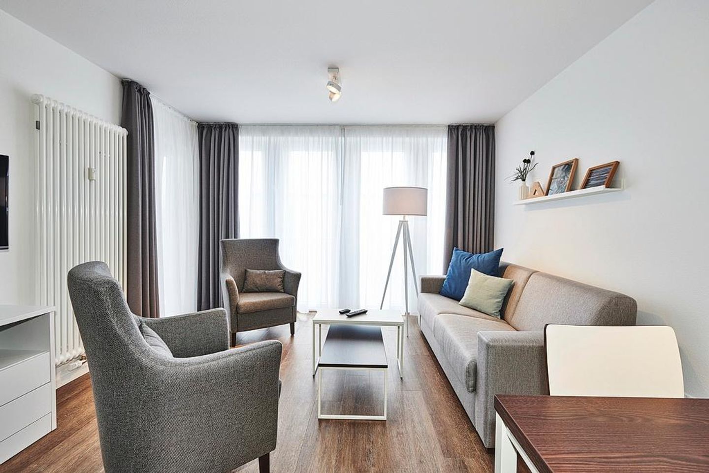 Deichhäuser Anna Küste Deichhäuser Anna Küste 2-34 Bensersiel - Wohn/Essbereich mit Sesseln und Couch