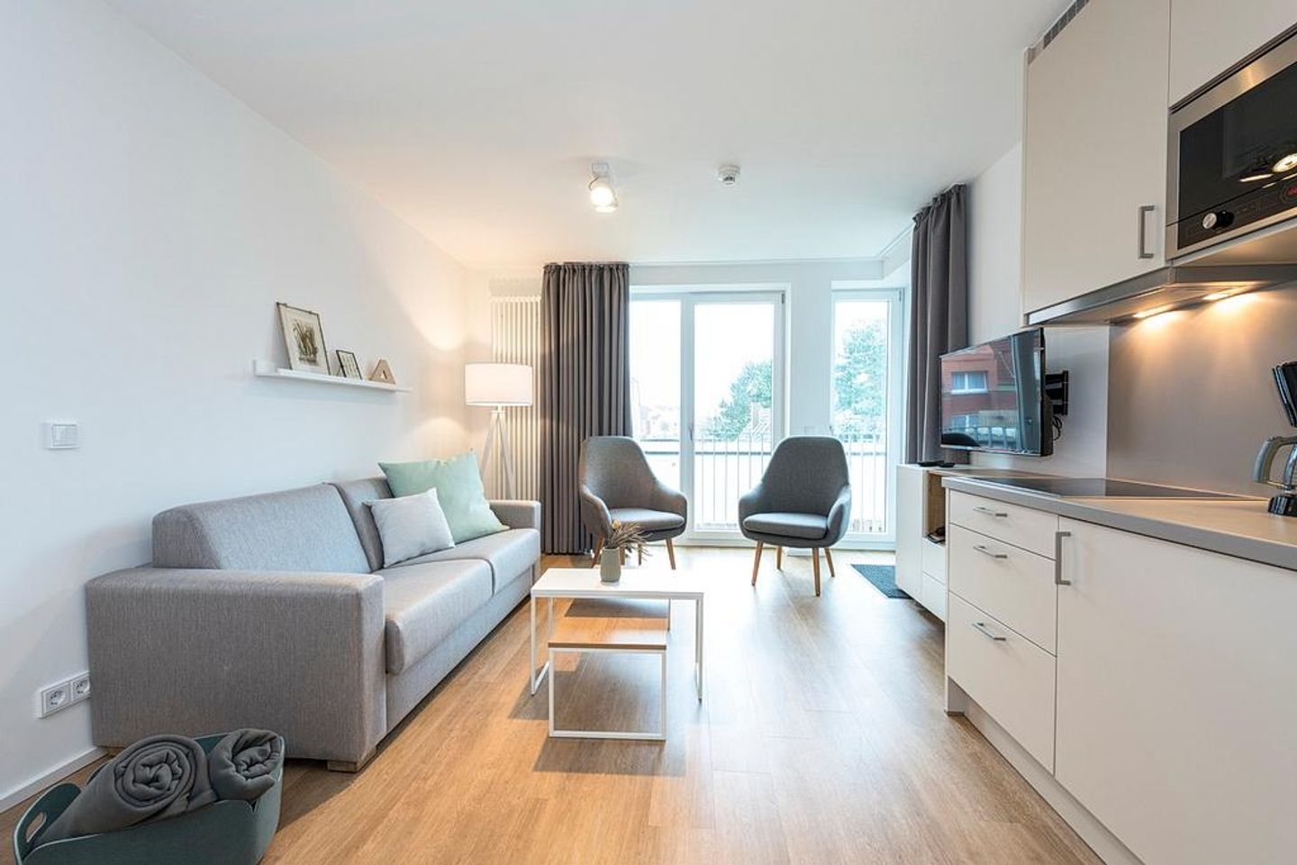 Apartmentvilla Anna See Apartmentvilla Anna See 2-07 Langeoog - Wohn-Essbereich mit Couch