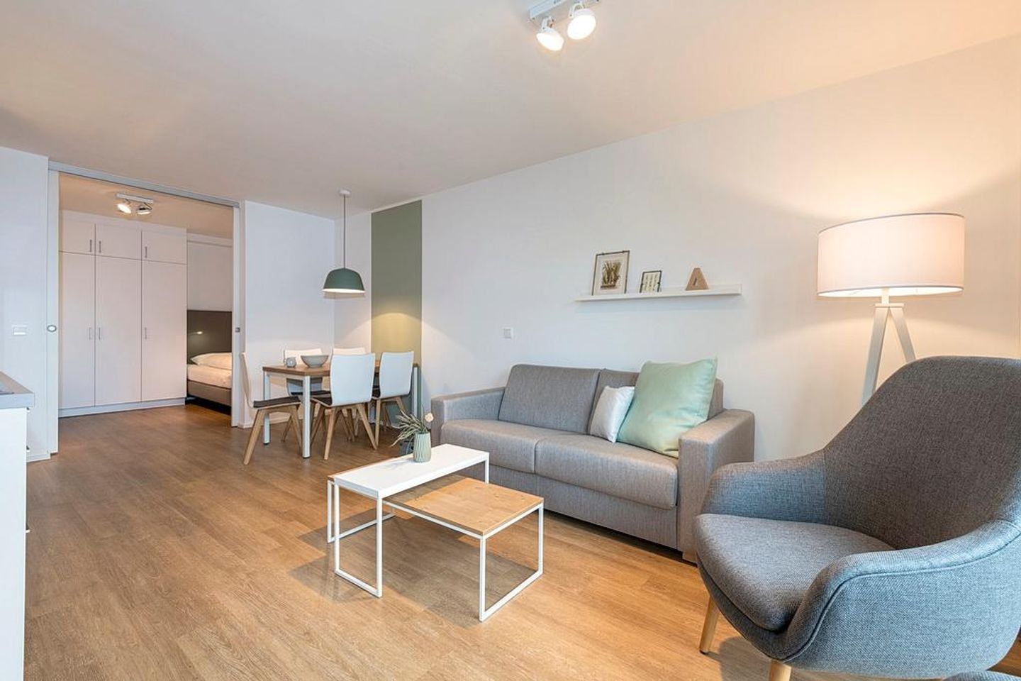 Apartmentvilla Anna See Apartmentvilla Anna See 2-07 Langeoog - Wohn-Essbereich mit Couch